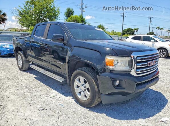 1GTP6CE16H1203402 2017 GMC CANYON Black Widok z przodu
