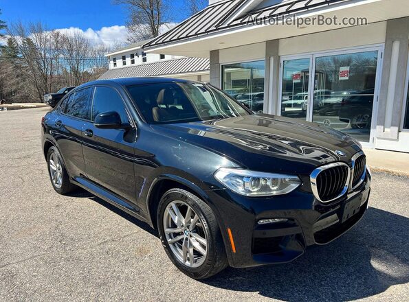 5UX2V1C01L9C64762 2020 BMW X4 Black Vista tres cuartos delantera izquierda