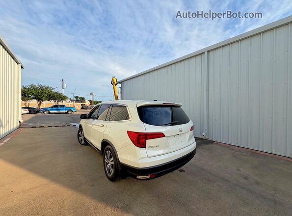 5FNYF5H57JB009487 2018 HONDA PILOT Белый Передняя правая четверть