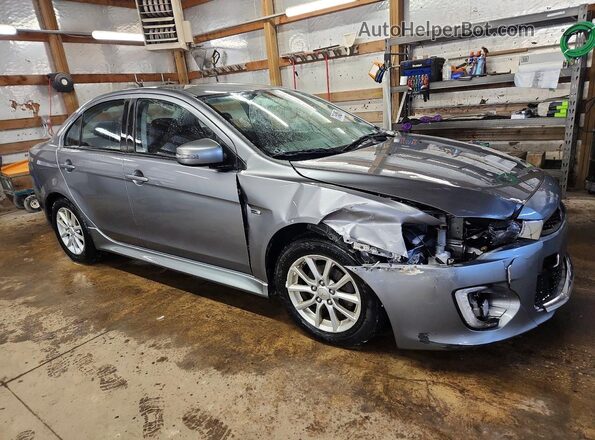 JA32U2FUXGU010586 2016 MITSUBISHI LANCER Серый Передняя правая четверть