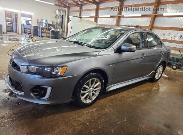JA32U2FUXGU010586 2016 MITSUBISHI LANCER Серый Передняя левая четверть