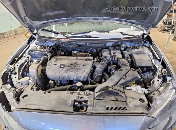 JA32U2FUXGU010586 2016 MITSUBISHI LANCER Серый Вид задней части салона