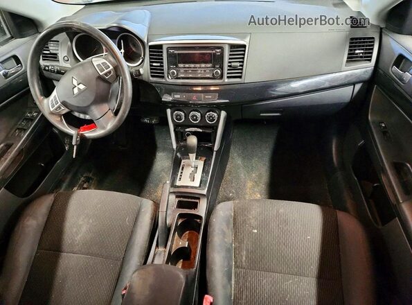 JA32U2FUXGU010586 2016 MITSUBISHI LANCER Серый Вид панели приборов