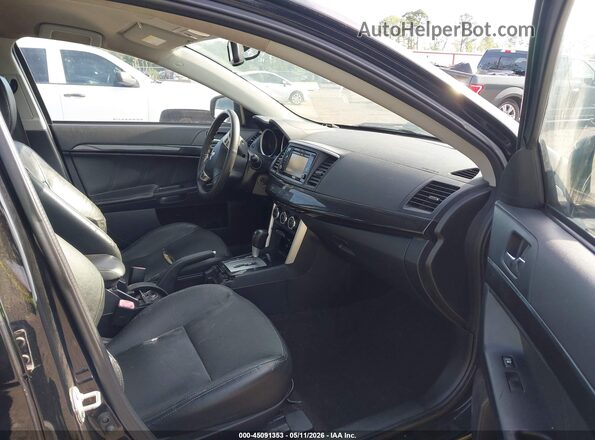 JA32V2FWXGU003202 2016 MITSUBISHI LANCER Black Vista interior delantera