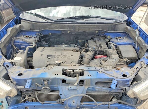JA4AP3AU0JU016948 2018 MITSUBISHI OUTLANDER Синий Вид задней части салона