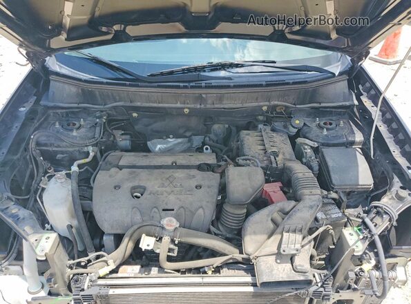 JA4AP3AW8JU025446 2018 MITSUBISHI OUTLANDER Black Rear interior view
