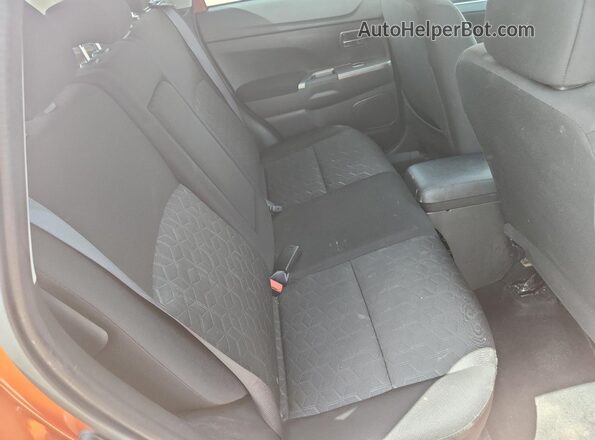 JA4AP4AU7LU000920 2020 MITSUBISHI OUTLANDER Оранжевый Вид задней части салона