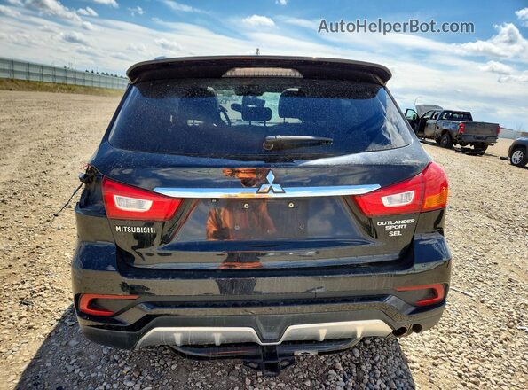 JA4AP4AW3JU024663 2018 MITSUBISHI OUTLANDER Черный Вид сзади