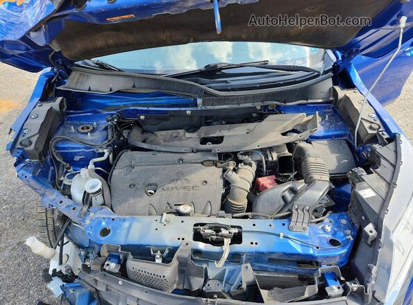 JA4APUAUXMU000329 2021 MITSUBISHI OUTLANDER Синий Вид подкапотного пространства