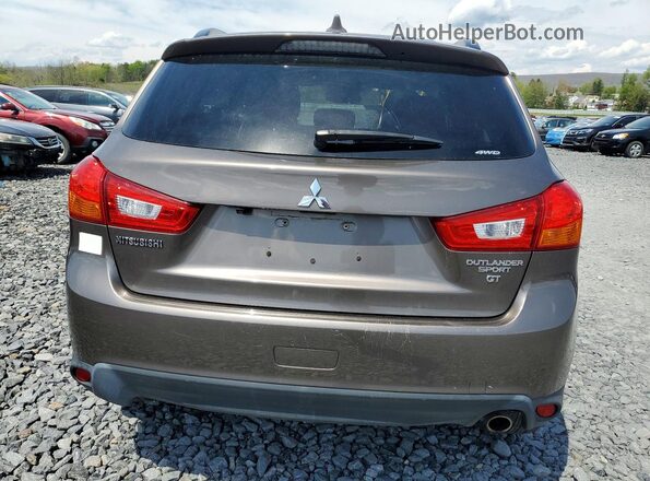 JA4AR4AWXHZ059790 2017 MITSUBISHI OUTLANDER Коричневый Вид сзади