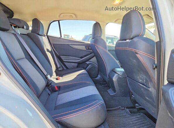 JF2GTABCXJH337038 2018 SUBARU CROSSTREK White Vista interior trasera