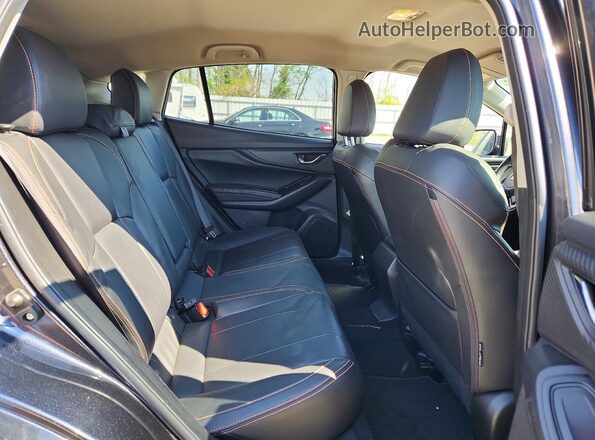 JF2GTAJC6JH213933 2018 SUBARU CROSSTREK Gray Vista de los asientos traseros