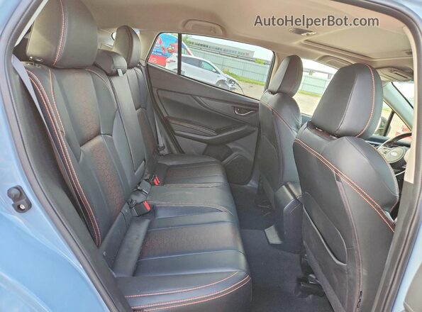 JF2GTHMC3N8200129 2022 SUBARU CROSSTREK Blue Vista interior trasera