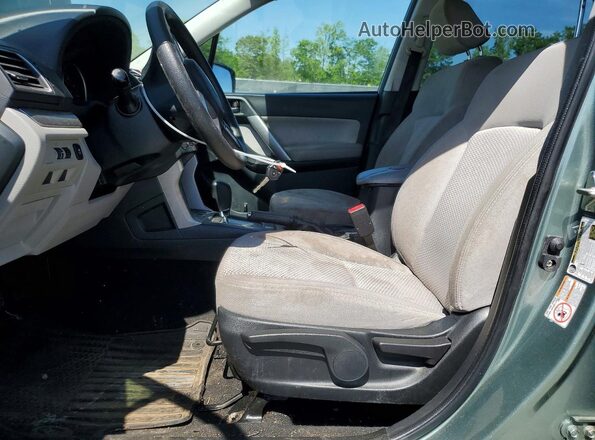 JF2SJABC6JH580846 2018 SUBARU FORESTER 2.5 Зеленый Вид салона спереди