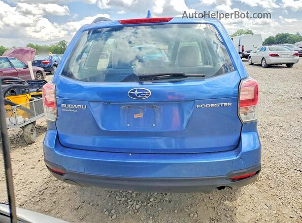 JF2SJABCXJH451573 2018 SUBARU FORESTER Blue Vista trasera