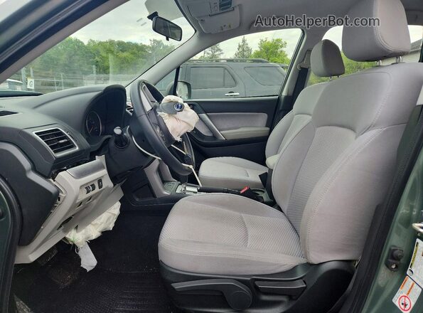 JF2SJABCXJH469457 2018 SUBARU FORESTER Зеленый Вид салона спереди