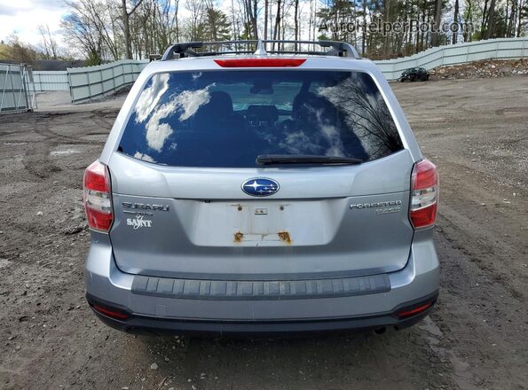 JF2SJADC2GH515627 2016 SUBARU FORESTER Silver Vista trasera