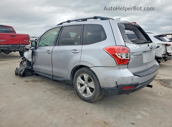 JF2SJADC7GH484312 2016 SUBARU FORESTER Silver Trasero izquierdo