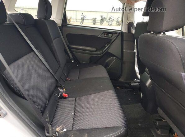JF2SJADC7GH484312 2016 SUBARU FORESTER Silver Vista interior trasera