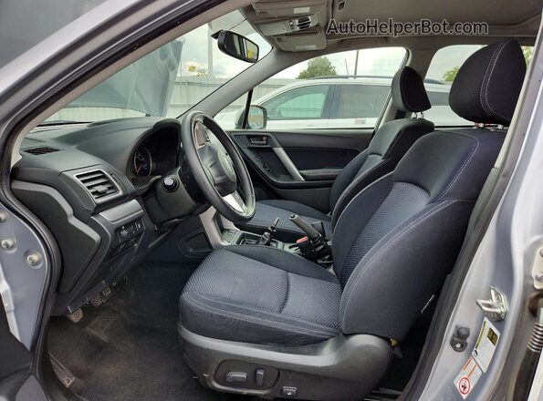 JF2SJADC8GG435223 2016 SUBARU FORESTER Серебряный Вид салона спереди