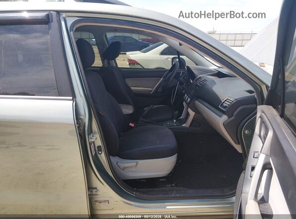JF2SJADC8GH519052 2016 SUBARU FORESTER 2.5 Зеленый Вид салона спереди