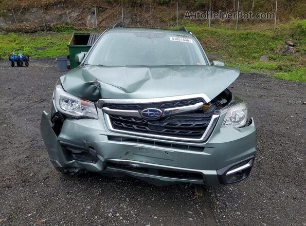 JF2SJAEC0JH489910 2018 SUBARU FORESTER Зеленый Вид спереди