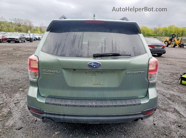 JF2SJAEC0JH489910 2018 SUBARU FORESTER Зеленый Вид сзади