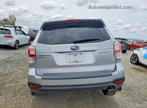 JF2SJAEC4HH418025 2017 SUBARU FORESTER Silver Widok z tyłu