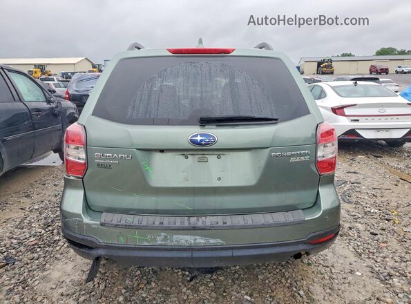 JF2SJAFC9GH500653 2016 SUBARU FORESTER Green Widok z tyłu