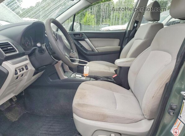 JF2SJAFC9GH500653 2016 SUBARU FORESTER Green Widok wnętrza z przodu
