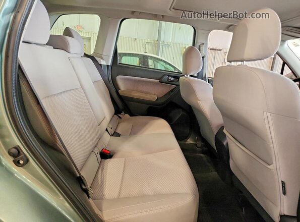 JF2SJAGC0JH458380 2018 SUBARU FORESTER Зеленый Вид задней части салона