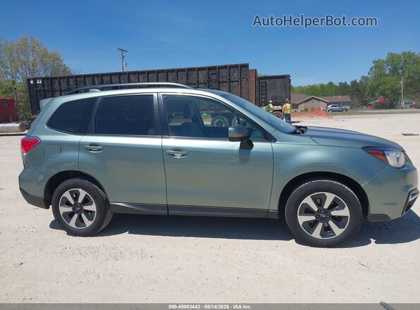 JF2SJAGCXJH545607 2018 SUBARU FORESTER Green Vista interior trasera