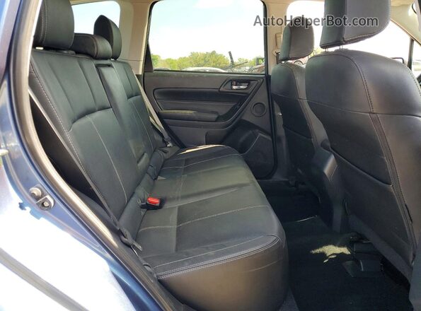 JF2SJAWC0HH453630 2017 SUBARU FORESTER Blue Vista interior trasera