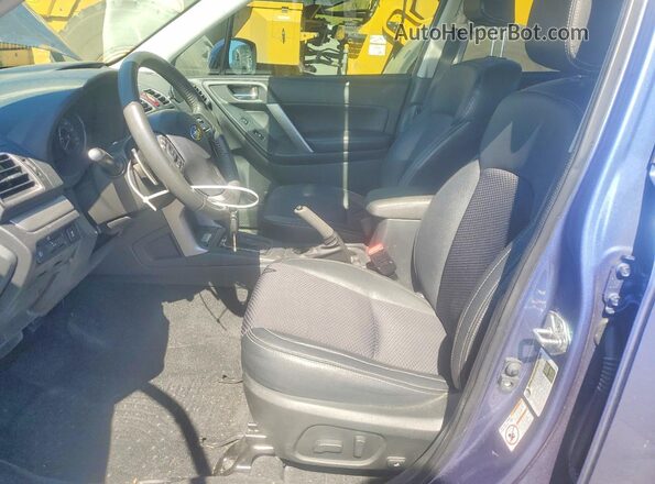 JF2SJGDC9GH524439 2016 SUBARU FORESTER Blue Vista interior delantera