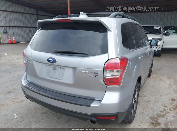 JF2SJGVC5GH551264 2016 SUBARU FORESTER2. Серебряный Задняя правая четверть