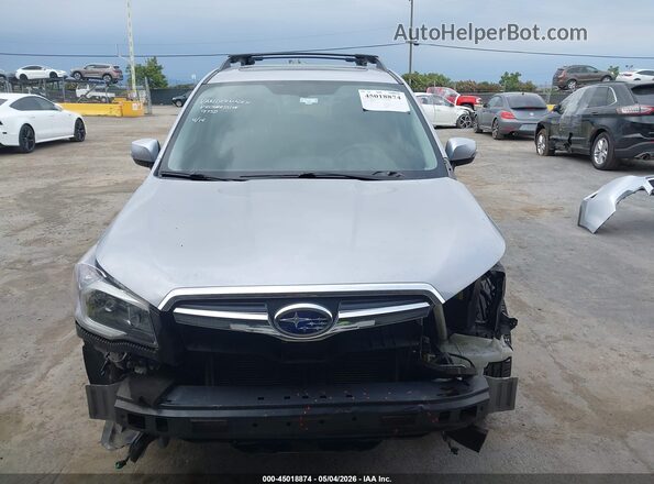 JF2SJGVC5GH551264 2016 SUBARU FORESTER2. Серебряный Вид задней части салона