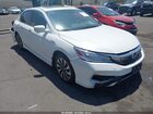 2017 Honda Accord Hybrid Touring White vin: JHMCR6F77HC030101