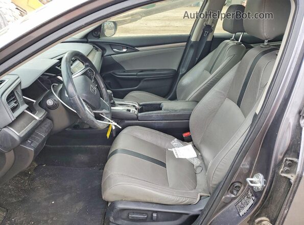 JHMFC1F77JX038571 2018 HONDA CIVIC Charcoal Front interior view