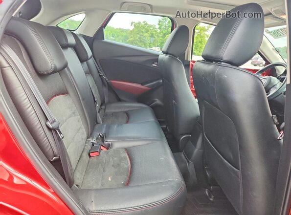 JM1DKBD73G0119282 2016 MAZDA CX-3 Red Rear interior view