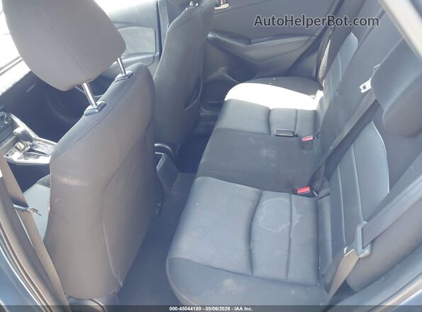 JM1DKDB71J0322483 2018 MAZDA CX-3 Blue Widok naklejki z numerem VIN