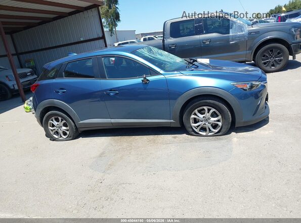 JM1DKDB71J0322483 2018 MAZDA CX-3 Blue Widok wnętrza z tyłu