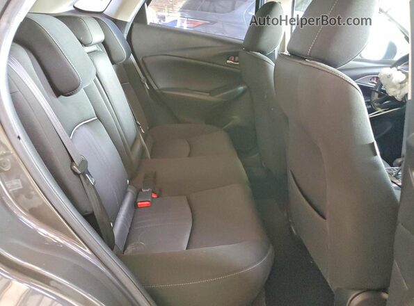 JM1DKDB72L1474818 2020 MAZDA CX-3 Gray Widok tylnych siedzeń