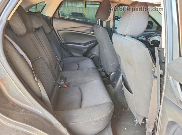 JM1DKDB74K0434065 2019 MAZDA CX-3 Серый Вид задней части салона