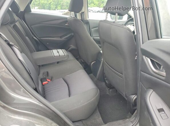 JM1DKFB70K0407635 2019 MAZDA CX-3 Charcoal Widok wnętrza z tyłu