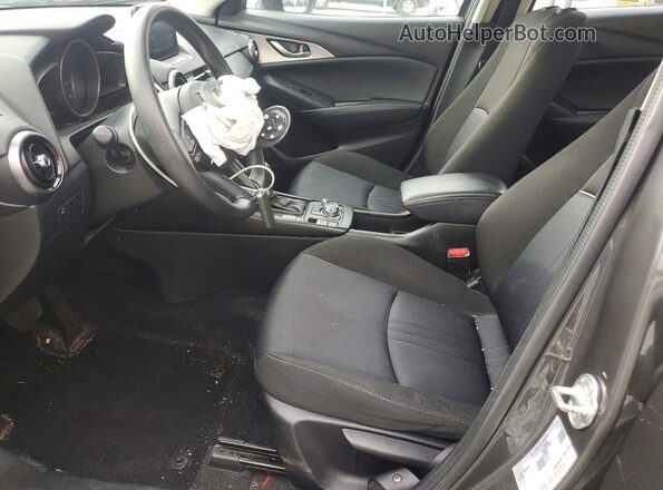 JM1DKFB70K0407635 2019 MAZDA CX-3 Charcoal Widok wnętrza z przodu