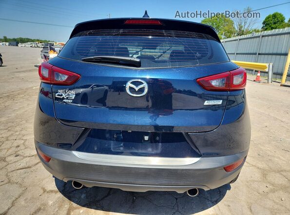 JM1DKFB76K0442907 2019 MAZDA CX-3 Blue Rear view
