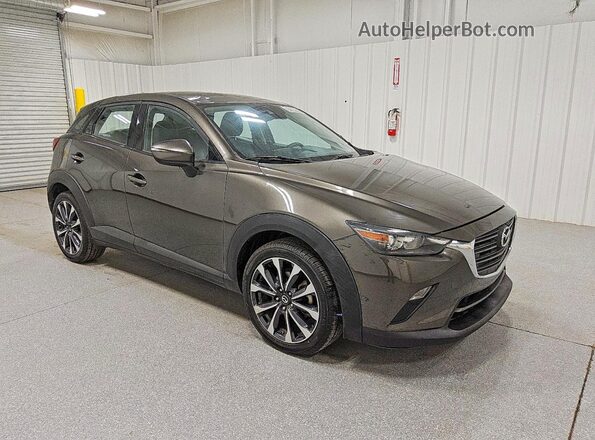 JM1DKFC71K0408419 2019 MAZDA CX-3 Серый Передняя правая четверть