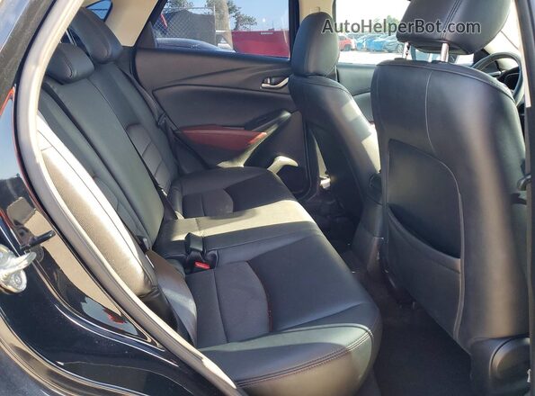JM1DKFC78H0177091 2017 MAZDA CX-3 Black Widok wnętrza z tyłu