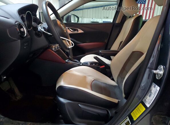 JM1DKFD72H0147227 2017 MAZDA CX-3 Gray Widok wnętrza z przodu