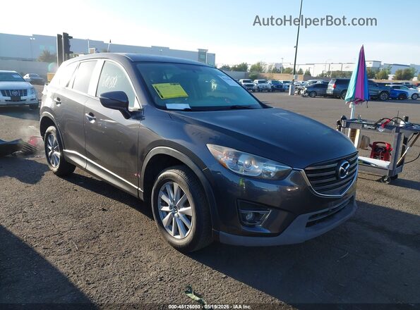 JM3KE2CYXG0633792 2016 MAZDA CX-5 Серый Передняя правая четверть